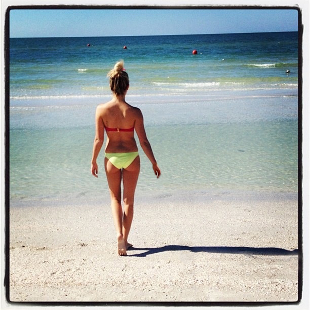 Ashley Tisdale in a bikini - ass