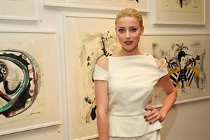 Amber Heard attends Tasya van Rees private viewing of Distorted Delicacies on June 22, 2011
