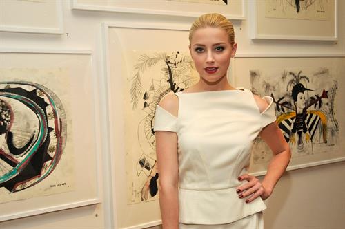 Amber Heard attends Tasya van Rees private viewing of Distorted Delicacies on June 22, 2011
