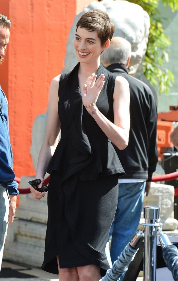 Anne Hathaway Christopher Nolan immortalized with hand and footprint ceremony on July 7, 2012