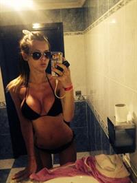 Anonymous in a bikini taking a selfie