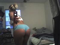 Anonymous in lingerie taking a selfie and - ass