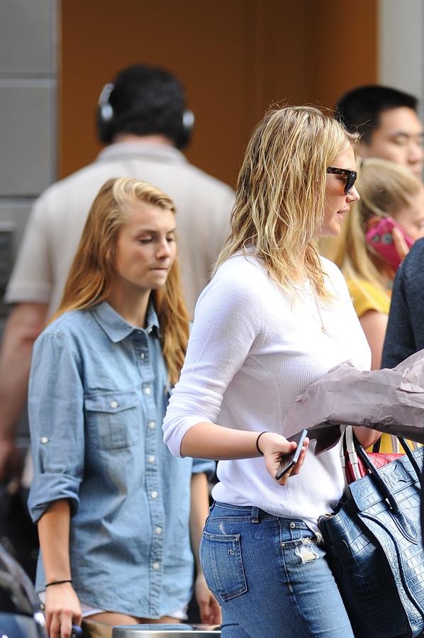 Kate Upton on her phone in New York City on June 21, 2013