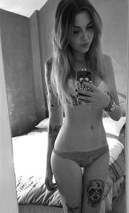 Anonymous in lingerie taking a selfie