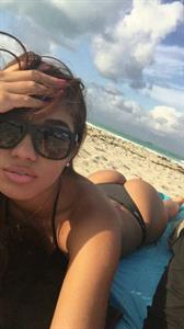 Anonymous in a bikini taking a selfie