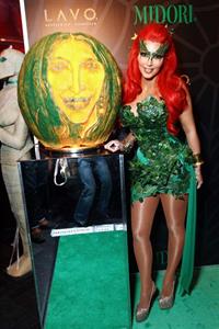 Kim Kardashian as Poison Ivy for the 2011 Midori Green Halloween party in New York