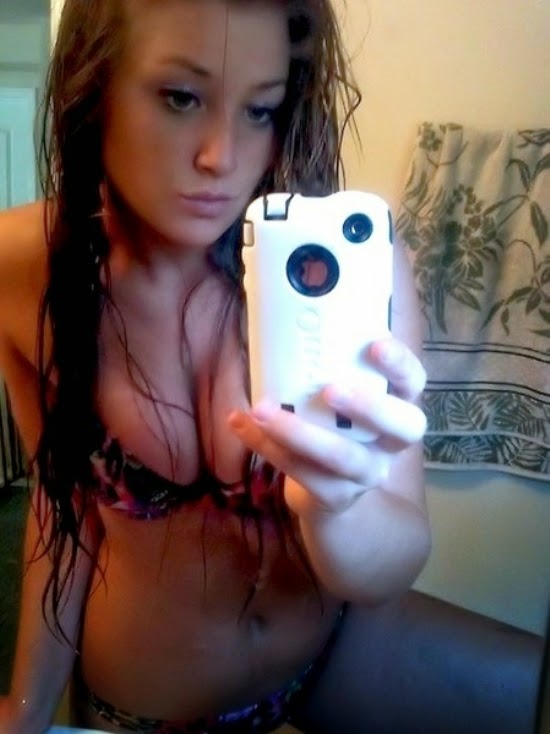 Anonymous in lingerie taking a selfie