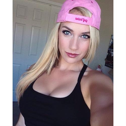 Paige Spiranac taking a selfie