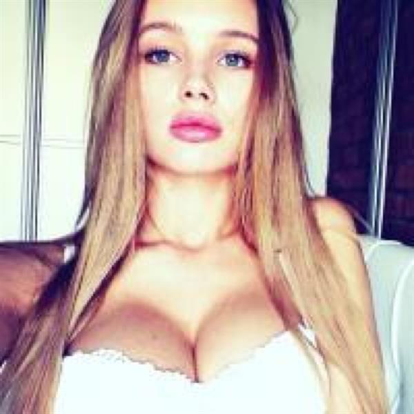 Olya Abramovich in lingerie taking a selfie