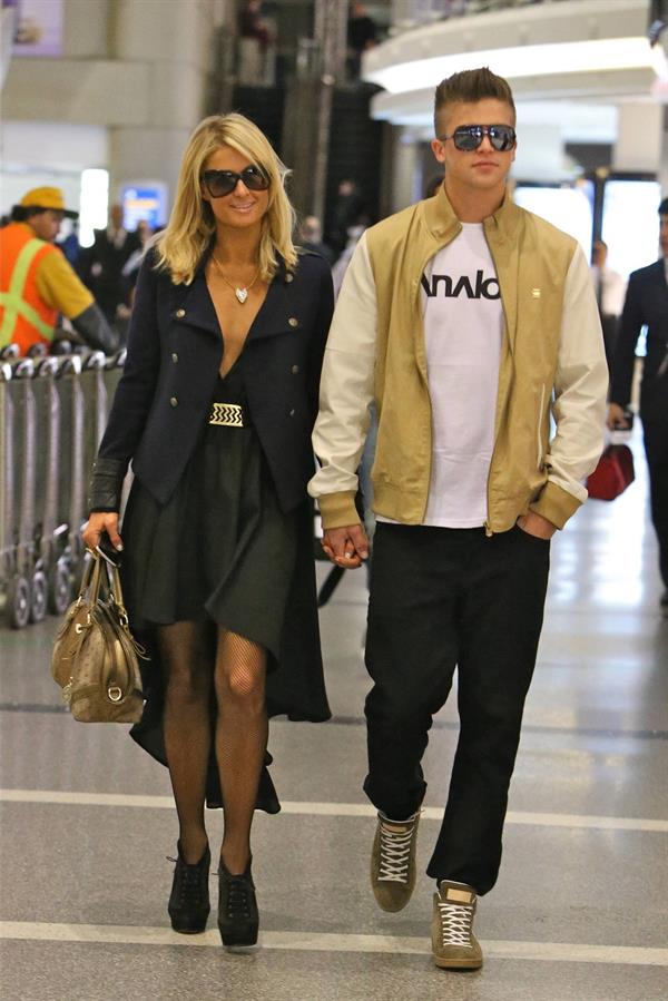 Paris Hilton arrives at LAX on January 25, 2013