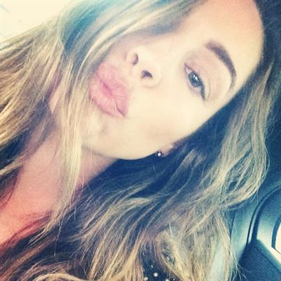 Kelly Brook taking a selfie