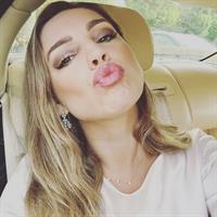 Kelly Brook taking a selfie