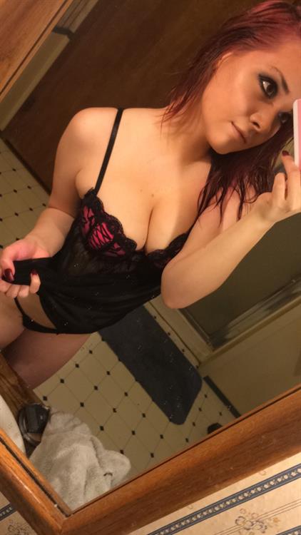 Anonymous in lingerie taking a selfie