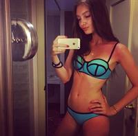 Polina Litvinova in a bikini taking a selfie