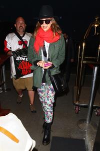 Jessica Alba arrives for an early morning flight at LAX, June 10, 2014