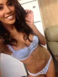 Janice Griffith in lingerie taking a selfie