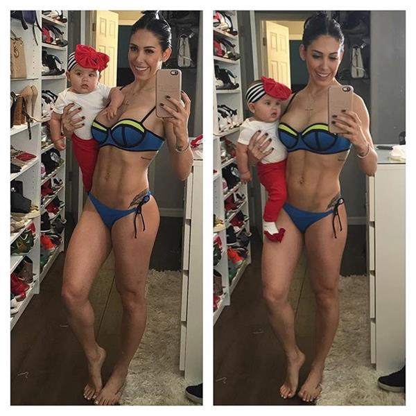 Bella Falconi in a bikini taking a selfie