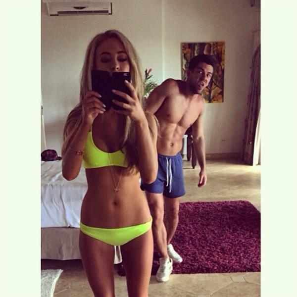 Nicola Hughes in a bikini taking a selfie