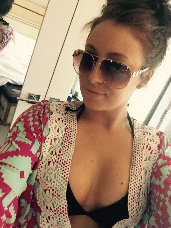 Anonymous in a bikini taking a selfie