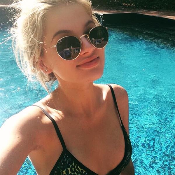 Megan Blake Irwin in a bikini taking a selfie