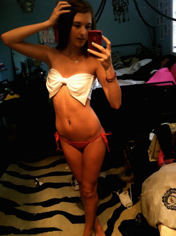Anonymous in a bikini taking a selfie
