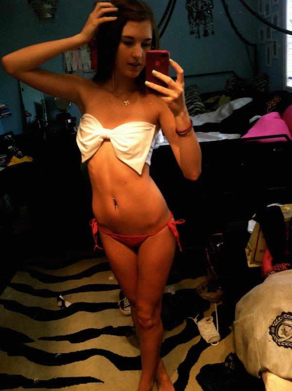 Anonymous in a bikini taking a selfie