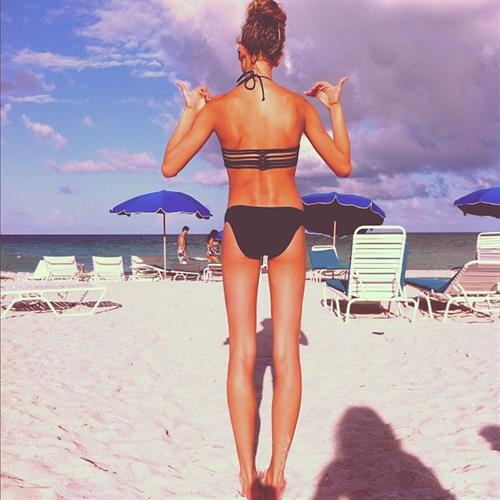 Hailey Bieber in a bikini - ass