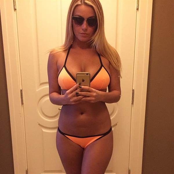 Ciara Price in a bikini taking a selfie