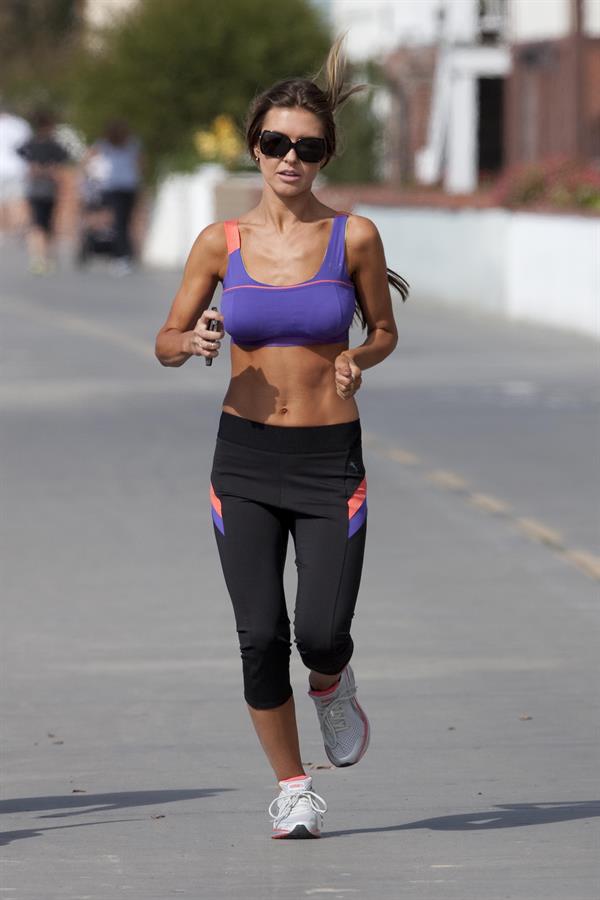 Audrina Patridge running on the beach in the South Bay