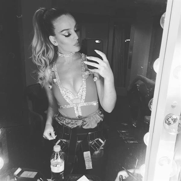 Perrie Edwards taking a selfie