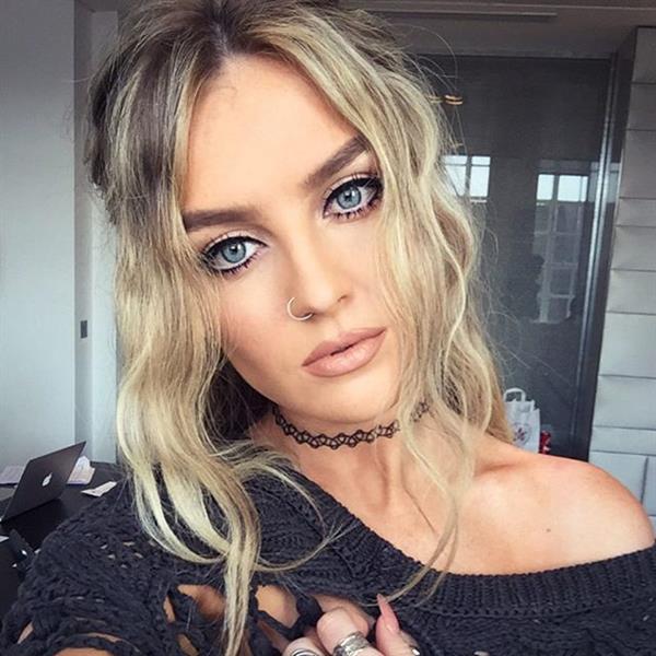 Perrie Edwards taking a selfie