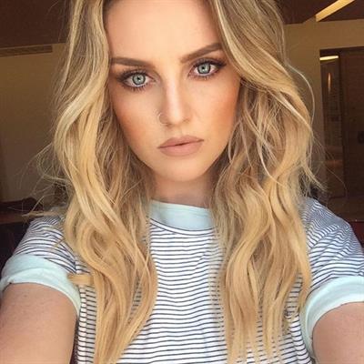 Perrie Edwards taking a selfie