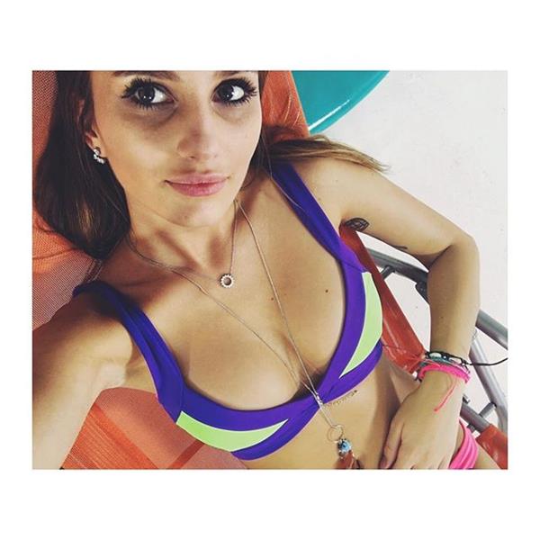 Paulina Mikolajczak in a bikini taking a selfie