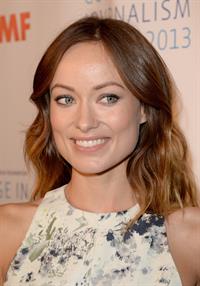 Olivia Wilde debuts her small baby bump while attending the 2013 International Women’s Media Foundation’s Courage in Journalism Awards at the Beverly Hills Hotel on Tuesday (October 29, 2013) in Beverly Hills, Calif.