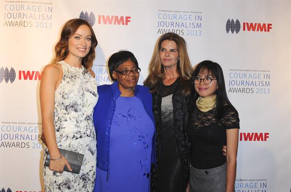 Olivia Wilde debuts her small baby bump while attending the 2013 International Women’s Media Foundation’s Courage in Journalism Awards at the Beverly Hills Hotel on Tuesday (October 29, 2013) in Beverly Hills, Calif.