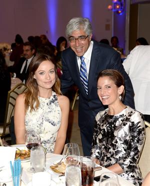 Olivia Wilde debuts her small baby bump while attending the 2013 International Women’s Media Foundation’s Courage in Journalism Awards at the Beverly Hills Hotel on Tuesday (October 29, 2013) in Beverly Hills, Calif.
