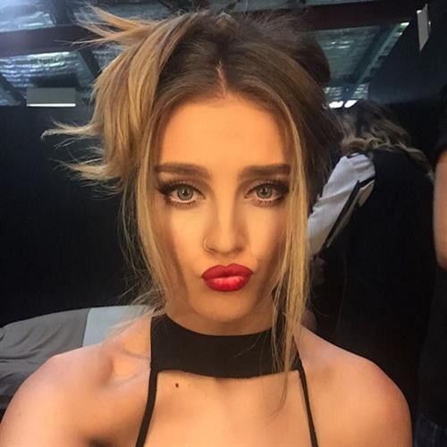 Perrie Edwards taking a selfie