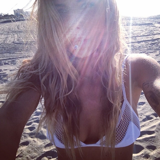 Sahara Ray in a bikini taking a selfie