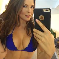 Amanda Cerny in a bikini taking a selfie