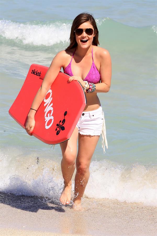 Lucy Hale and Ashley Benson photoshoot at the Bondo Bikini Shack on Miami Beach on March 24, 2012