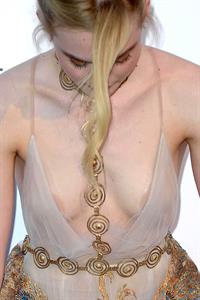 Elle Fanning showing off pasties at amfAR’s 23rd Cinema Against AIDS Gala