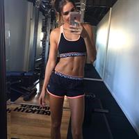 Kayla Itsines taking a selfie