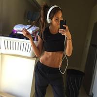 Kayla Itsines taking a selfie