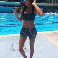 Kayla Itsines taking a selfie