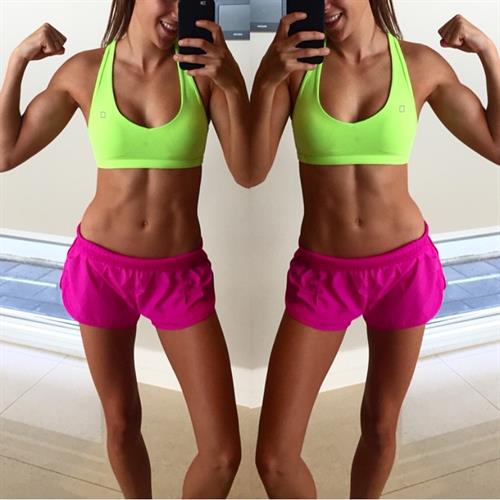 Kayla Itsines taking a selfie