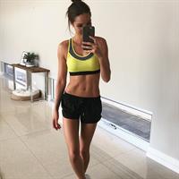 Kayla Itsines taking a selfie