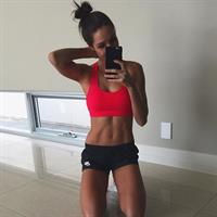 Kayla Itsines taking a selfie