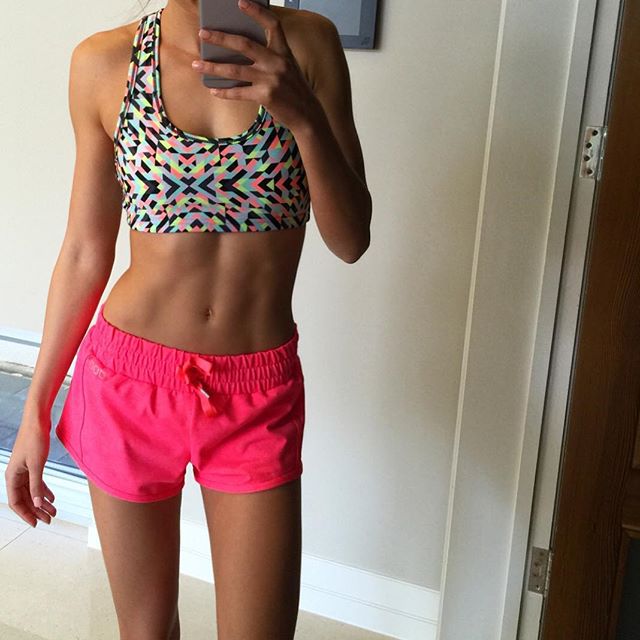 Kayla Itsines taking a selfie