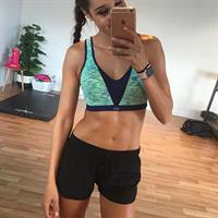 Kayla Itsines taking a selfie