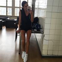 Kayla Itsines taking a selfie